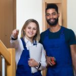 Woman handyman giving instructions to man for home improvement project